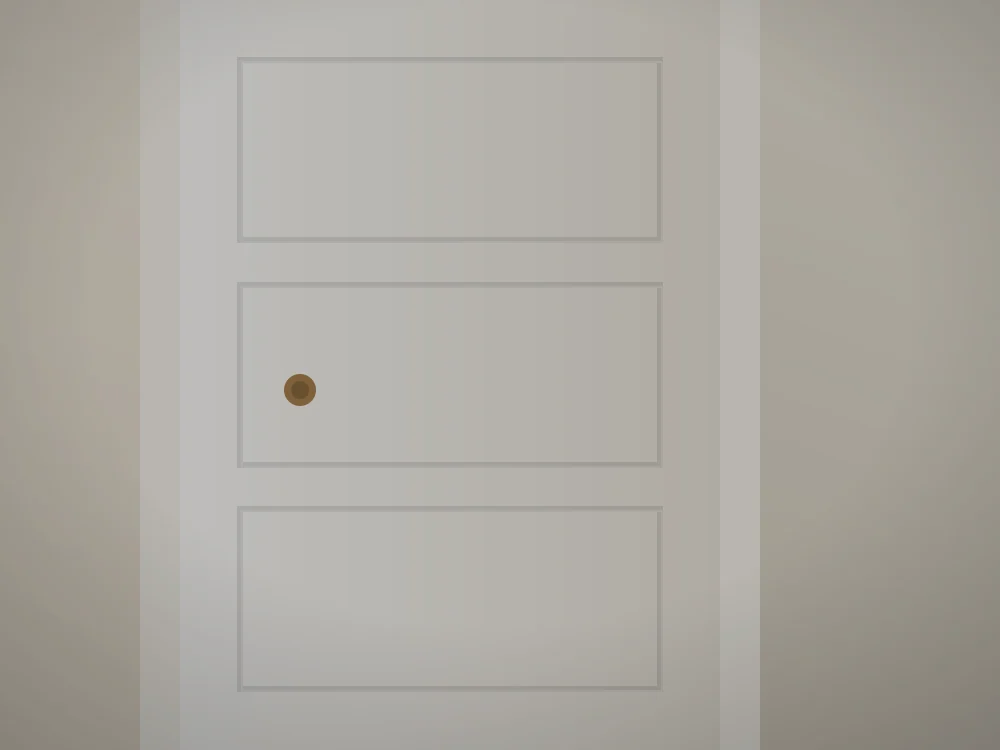 Detailed woodwork on a panelled door with a brass handle